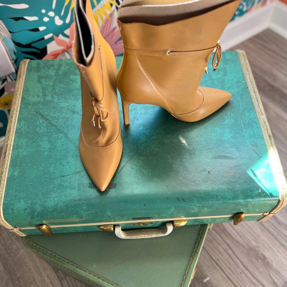 Nine West; Macadamia nut, top stitched, stiletto bootie.